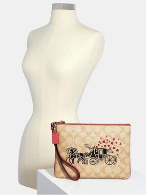 NWT Coach horse and carriage gallery pouch 9 1/4" x 6 3/4"
